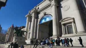 crowd of people outside American Museum of Natural History NYC